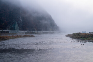 The view of the early autumn morning when the water fog rises