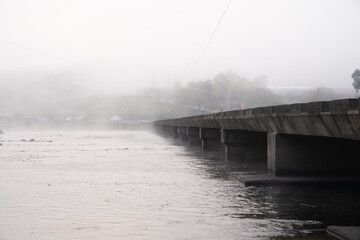 The view of the early autumn morning when the water fog rises