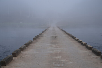 Obraz premium The view of the early autumn morning when the water fog rises