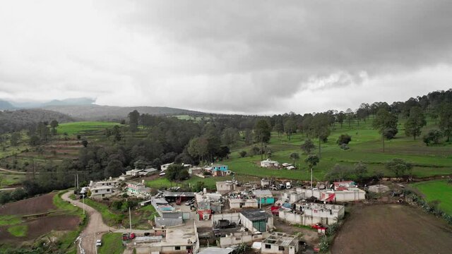 Aerial dolly in over rural estate in Mexico countryside at day