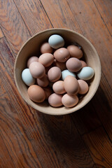 Many fresh eggs in a bowl