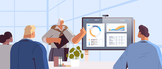 businesswoman presenting financial statistic diagram for businesspeople at conference meeting business presentation