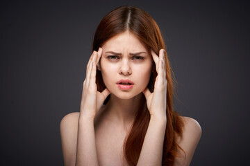 Obraz premium woman with bare shoulders and beautiful hairstyle close-up attractive look