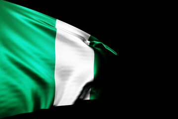 3D illustration of the national flag of Nigeria. on a metal flagpole fluttering against the blacl...