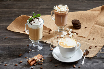 different types of coffee drinks over wooden background