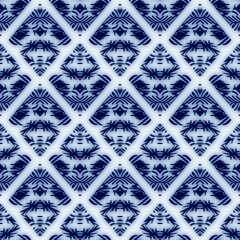 Seamless blue and white ceramic tile ornate damask pattern for surface design and print. High quality illustration. Fancy swatch resembling dutch delft blue classical pottery. Trendy flourish design.