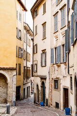 Fototapeta na wymiar Narrow streets with old houses. Bergamo, Italy