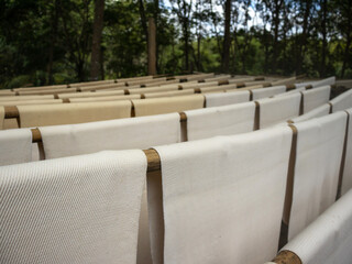 Rubber sheets, hanging in the sun on the wood in order.