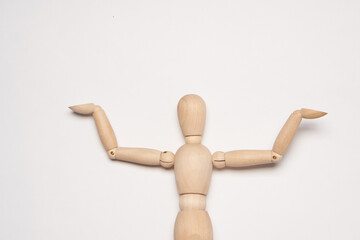 wooden mannequin toy object posing design light background