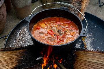 Kettle goulash is prepared over an open fire!