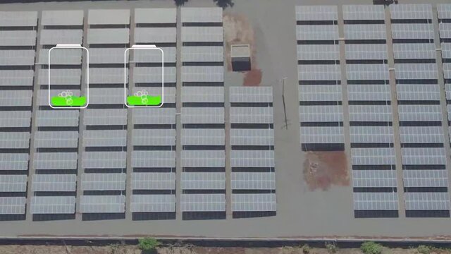 Alternative energy  wind mill and solar panel green energy production. Solar panel produces green, environmentally friendly energy from sun. Landscape solar plant that is located inside a valley