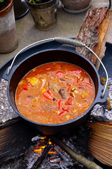 Kettle goulash is prepared over an open fire!