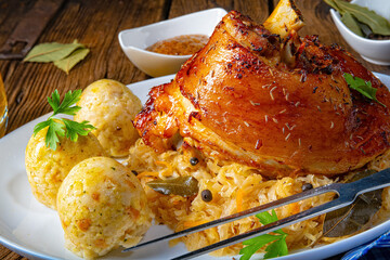 pork knuckle with sauerkraut and sweet mustard