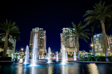 Fototapeta na wymiar Doha,Qatar,01/27/2016-The night view fountain at the pearl, porto Arabia