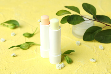 Concept of eco face care cosmetic on yellow textured background