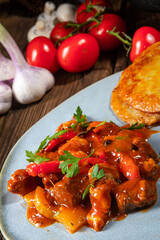 Original Hungarian goulash with potato pancakes