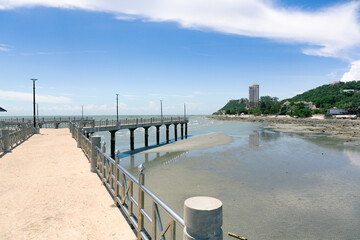 Fototapeta premium Bridge at Bang Saen beach with blue sky. Chonburi, Thailand.