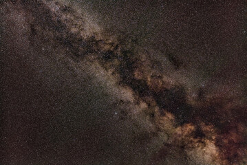 Night sky, many stars with milky way around Aquila and Sagitta constellation visible. Long exposure stacked photo