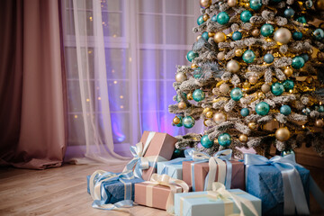 Gift boxes under the Christmas tree, Christmas decorations for the home, Santa Claus gift wrapping, Christmas tree decorated with a garland