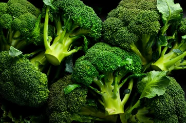 Poster Fresh green broccoli. Macro photo. Top view. © Yaruniv-Studio