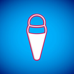 White Ice cream in waffle cone icon isolated on blue background. Sweet symbol. Vector