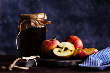 Red apples on a wooden table.