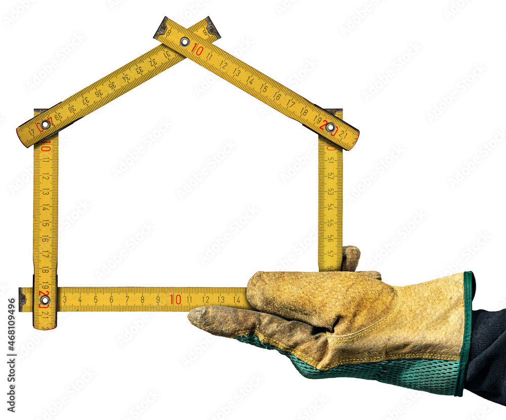 Poster close-up of a hand with work glove holding a folding ruler in the shape of a house, isolated on whit