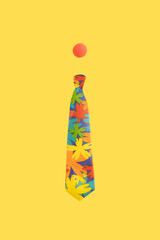 Colorful necktie and red nose. Minimal funny concept on yellow background.
