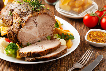 Whole cooked pork neck.