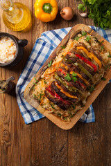 Roasted whole in sauerkraut, stuffed pork neck.