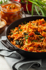 Kimchi cabbage with chicken. Prepared in a wok.