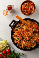 Kimchi cabbage with chicken. Prepared in a wok.