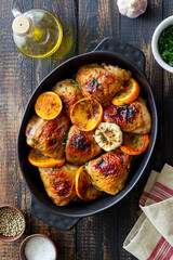 Baked chicken with oranges, garlic and mint. Recipe.