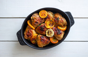 Baked chicken with oranges, garlic and mint. Recipe.
