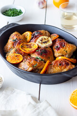 Baked chicken with oranges, garlic and mint. Recipe.