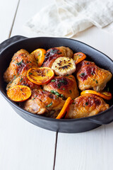 Baked chicken with oranges, garlic and mint. Recipe.