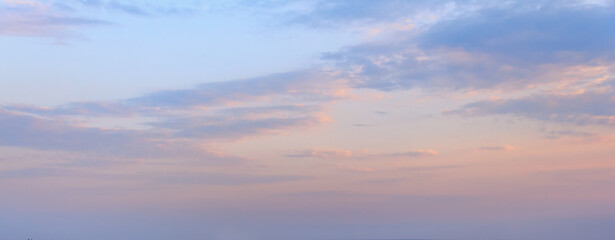 Naklejka na ściany i meble Beautiful clouds in the twilight on clear sky. Banner