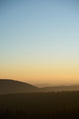 Obraz premium Landscape view on mountains in evening, sunset time. Vertical.