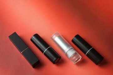 Close-up of lipstick on a red background