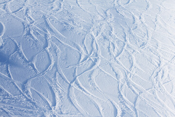Tracks on snow in mountains - 468119833