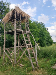 Hut made of wooden sticks. A house of branches. Post of guard of graying, villages. Wigwam.