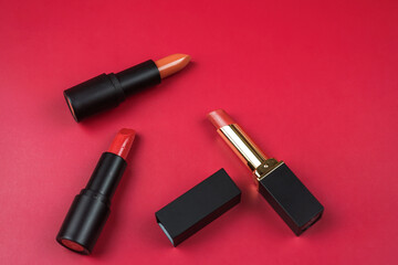 beautiful lipstick on red background