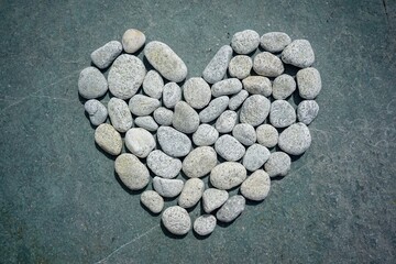 Fototapeta na wymiar Heart made of sea stones