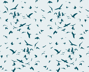 A seamless background with flight of birds.