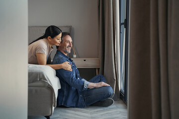 Obraz premium Happy romantic mature couple staying at home