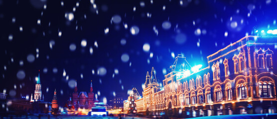 Fototapeta na wymiar Winter night light Moscow Red square with snow. Christmas panorama Russia holidays GUM new year background bokeh