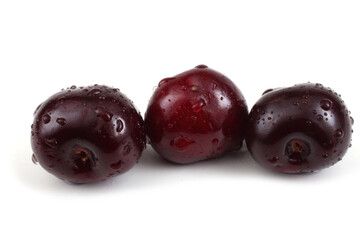 Two dark cherries