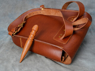 the process of processing the sides of the leather backpack
