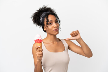 Fototapeta na wymiar Young african american woman with a cornet ice cream isolated on white background proud and self-satisfied