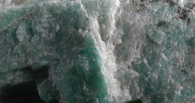 Amazonite. Exotic ornamental stone. Close-up mineral texture. Panorama.